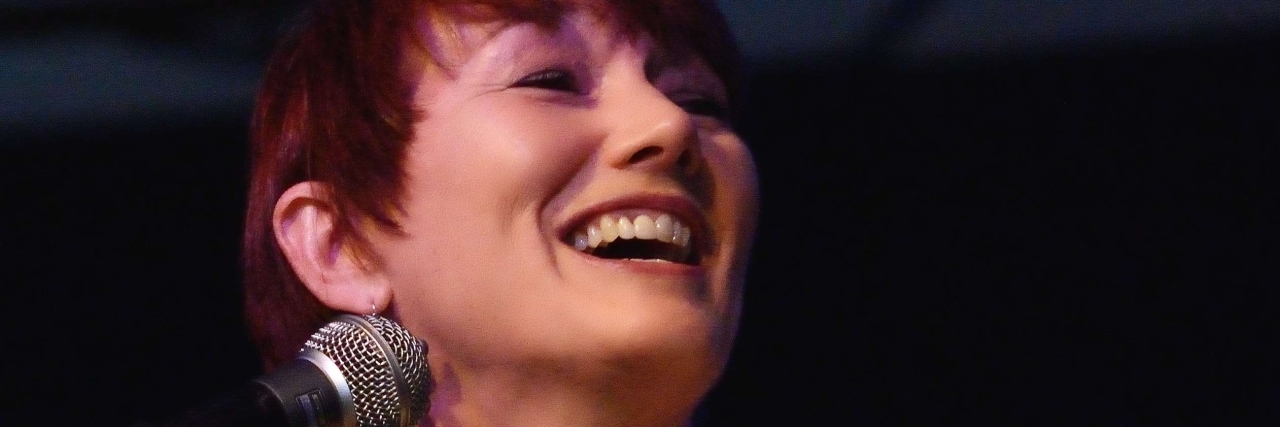 Country Singer Lari White Dies at 52 From Rare Cancer Lari White singing onstage