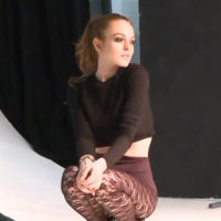 Lindsay Lohan poses for Elle in a brown ensemble