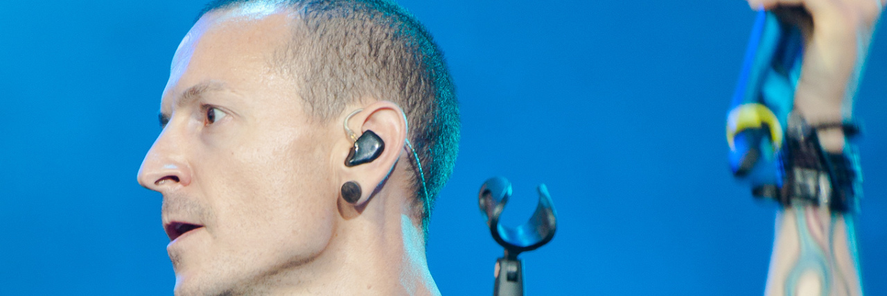 Brian Welch Criticized for His Post About Chester Bennington's Suicide Chester Bennington performing onstage.