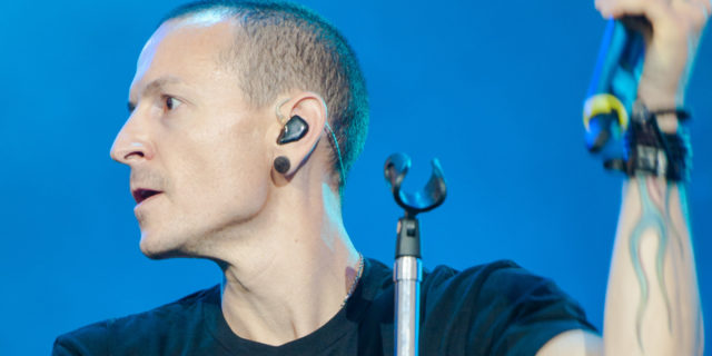 Chester Bennington performing onstage.