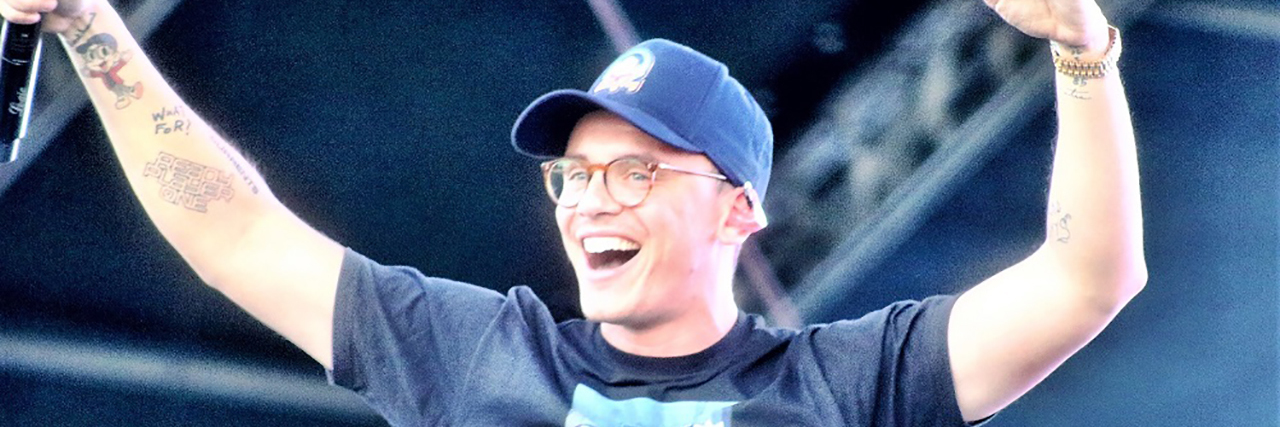 Rapper Logic performing onstage