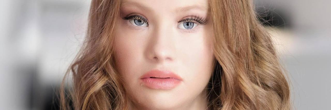 Madeline Stuart Dazzles in Wedding Photo Shoot A portrait of Madeline Stuart looking at the camera