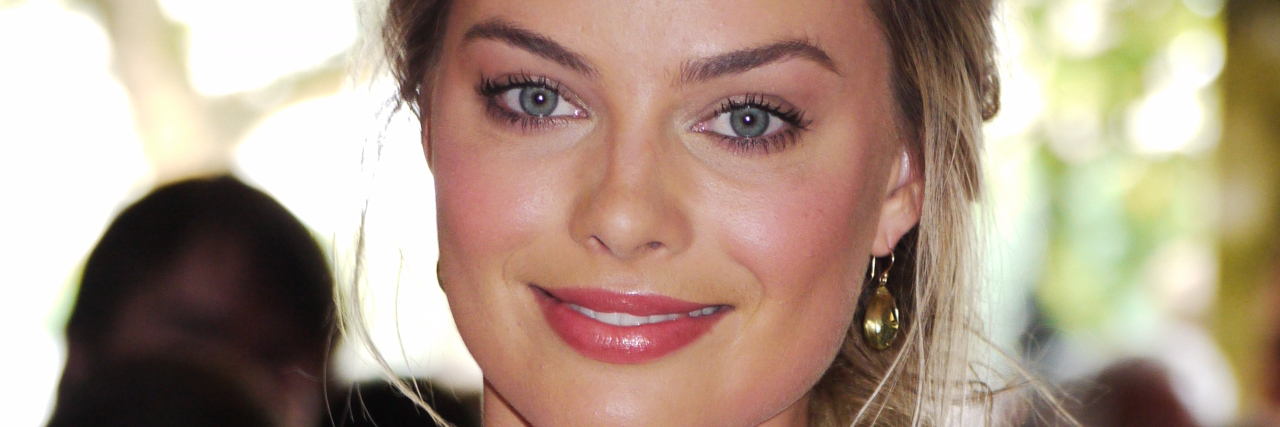 Margot Robbie Defends the Way 'I, Tonya' Handles Domestic Violence Margot Robbie on a red carpet