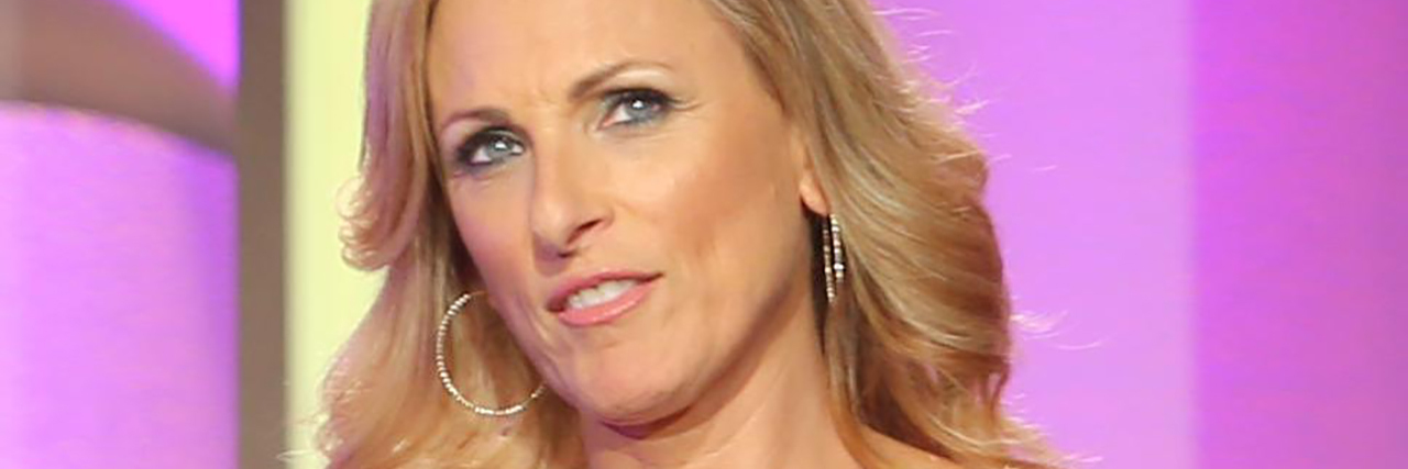 Deaf Actress Marlee Matlin Responds to Reports Trump Called Her the R-Word Marlee Matlin signing onstage at an award show