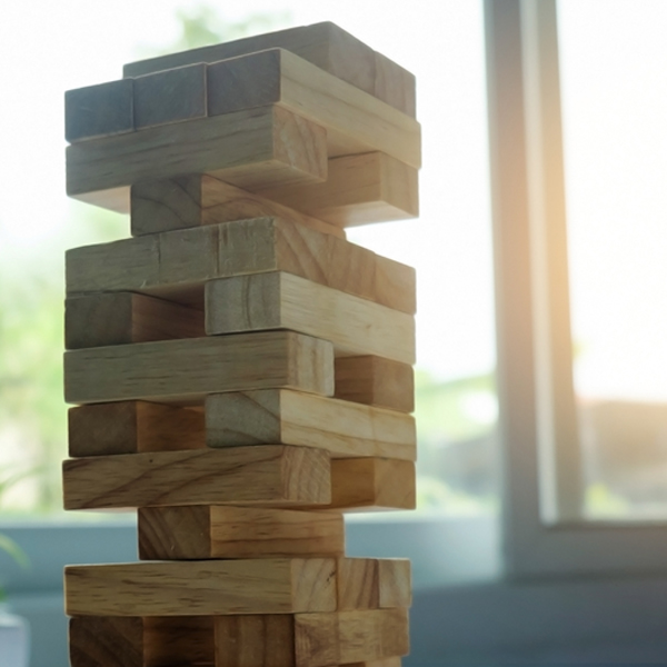 A game of Jenga with missing pieces.