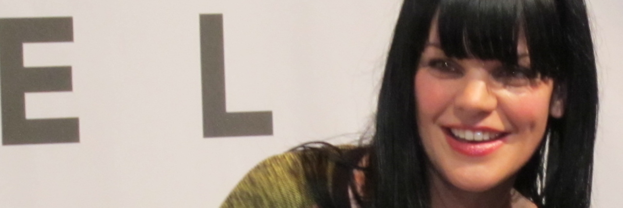 Pauley Perrette Implies She Was Physically Assaulted While on 'NCIS' Pauley_Perrette signing an autograph