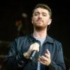 Sam Smith performs in a black and white outfit at Lollapalooza