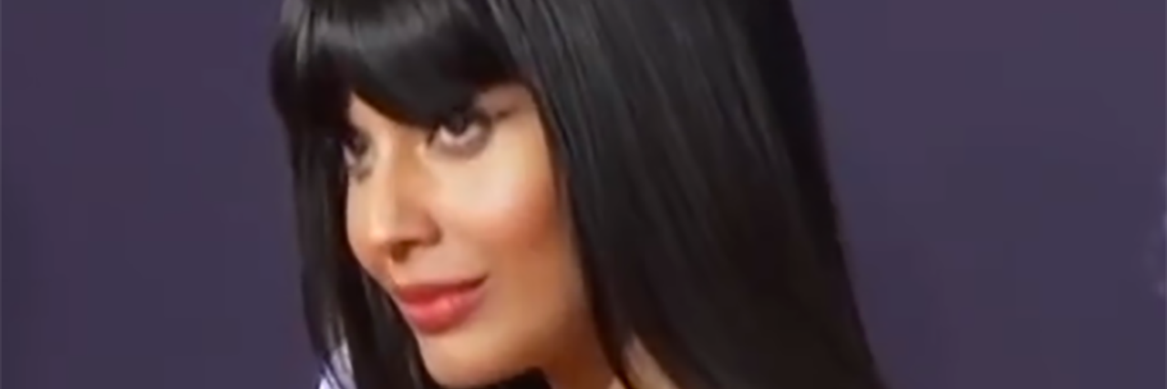 Consequences of Jameela Jamil Being Accused of Munchausen Syndrome Jameela Jamil is on the red carpet and is wearing silver and black sparkly dress