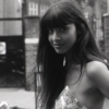 A black and white photo of Jameela Jamil