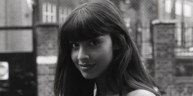 A black and white photo of Jameela Jamil