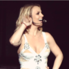 Britney Spears smiles onstage at one of her concerts