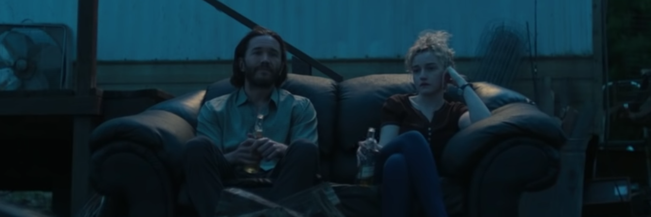 Netflix’s ’Ozark’ Nails What It's Like to Go Off Bipolar Medication screenshot from season 3 of Ozard depicting ben davis on sofa with another character