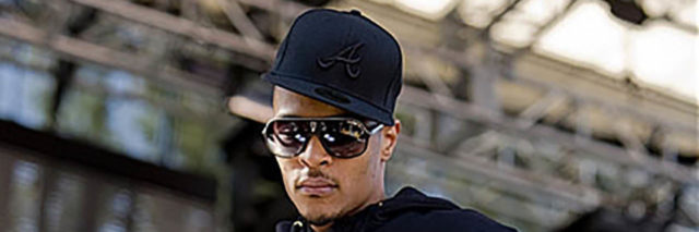 T.I. performing at an outdoor concert