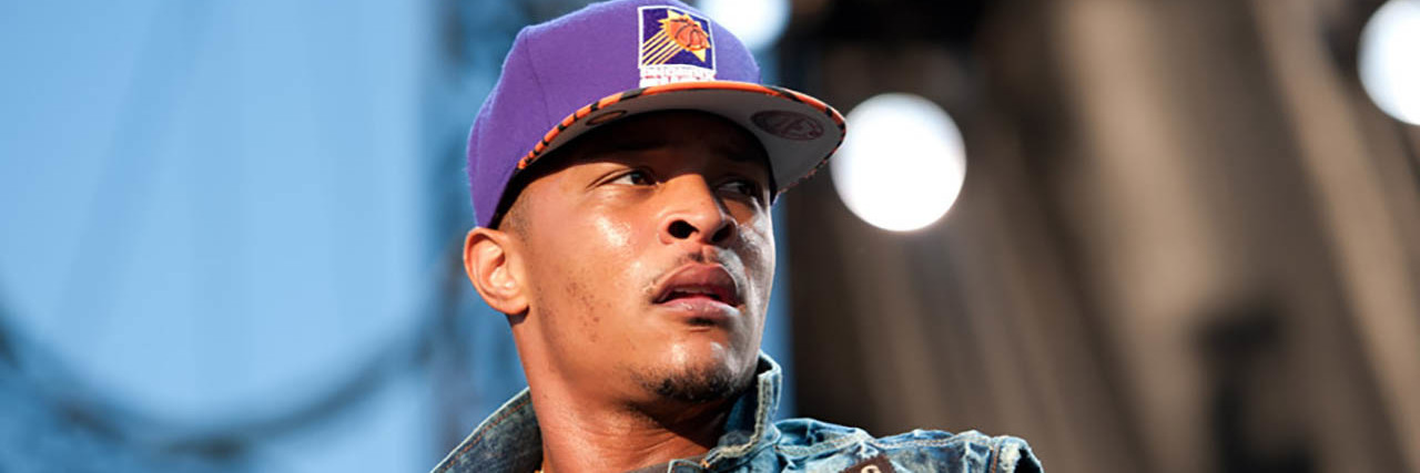 T.I. Finally Addresses Comments About Checking His Daughter's Hymen T.I. performing at an outdoor concert