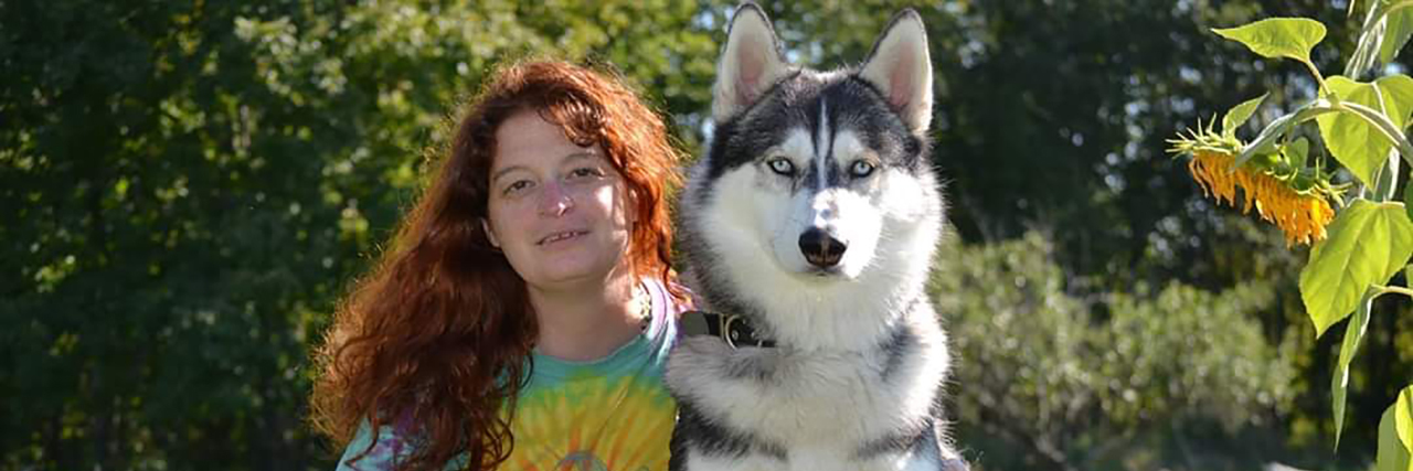 Kimberly with her husky Takoda.