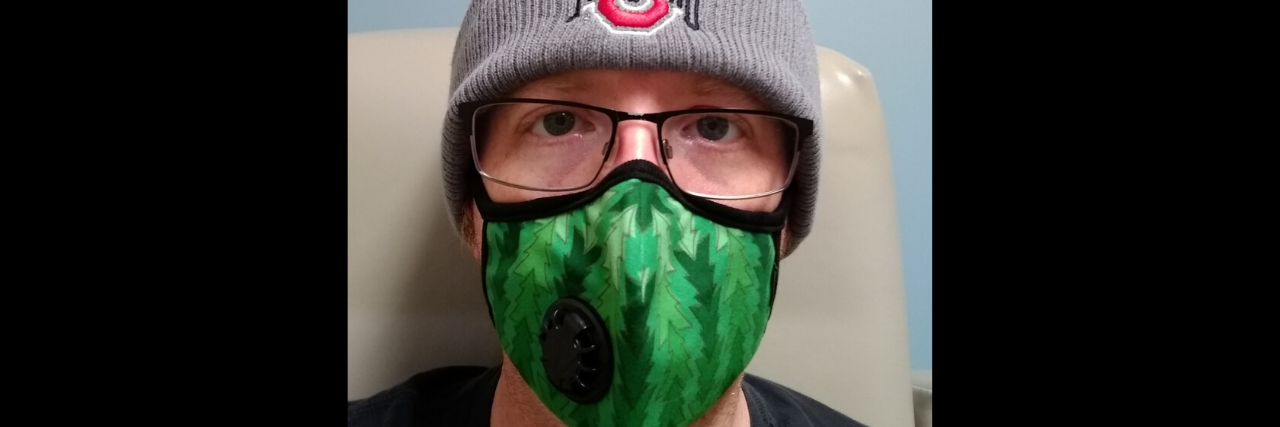 Response to Dan Patrick: 'There Are More Important Things Than Living' Man wearing face mask