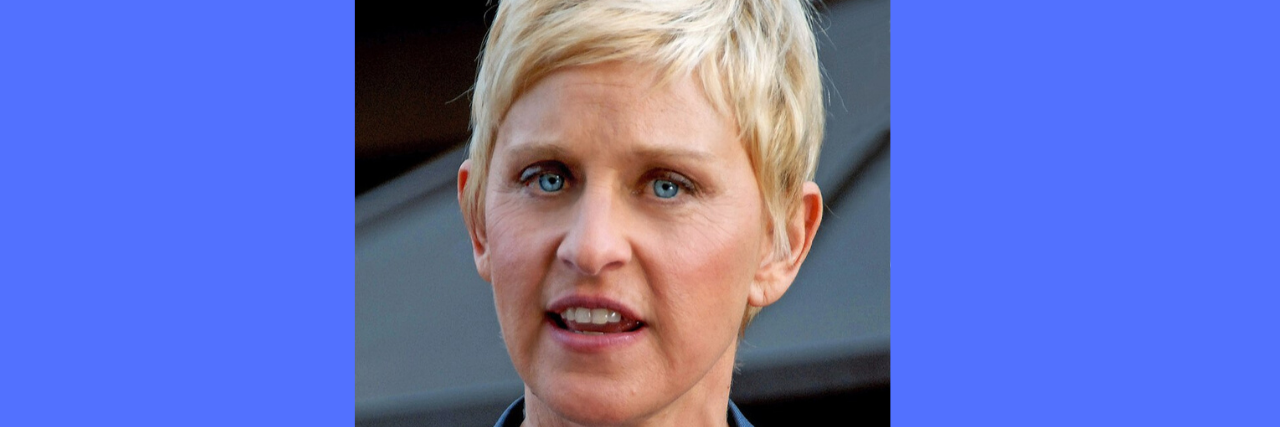 Ellen Shares She Was Sexually Assaulted by Her Stepfather as a Teenager Ellen DeGeneres wears a blue suit while outsite