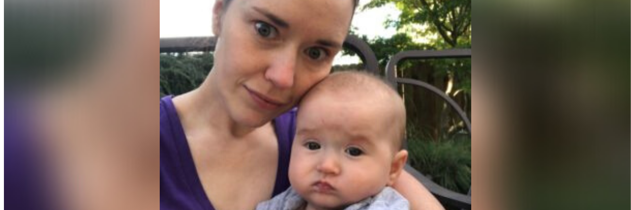 Surviving Not 'Thriving' With Mental Illness Is Enough During COVID-19 selfie of author and her baby