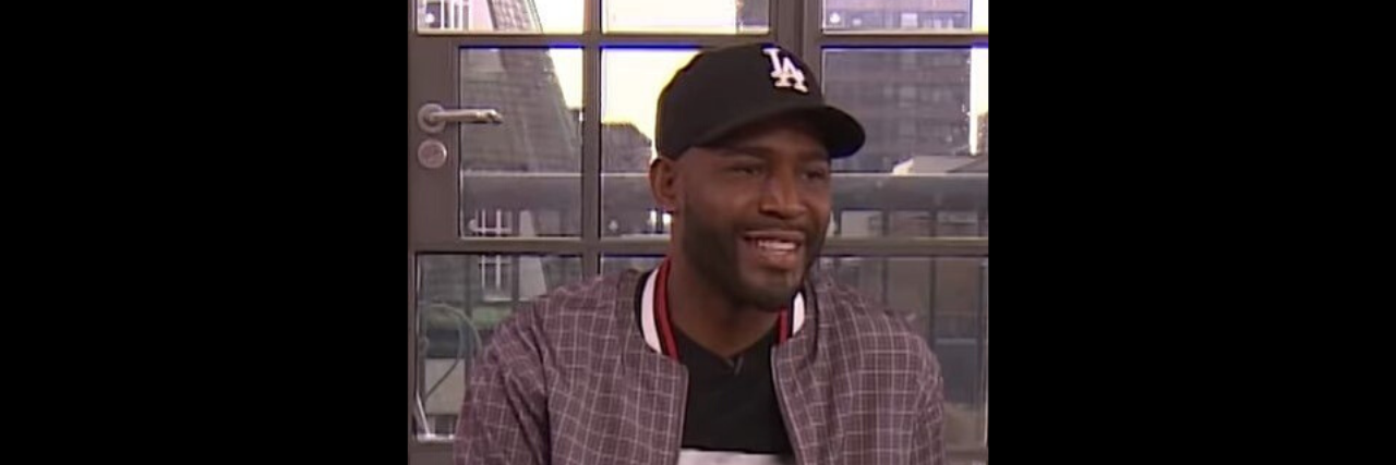 'Queer Eye' Star Karamo Brown Is Learning How to be a Disability Ally Karamo Brown smiles while talking to a reporter on MTV