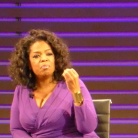 Oprah Winfrey speaking to a crowd
