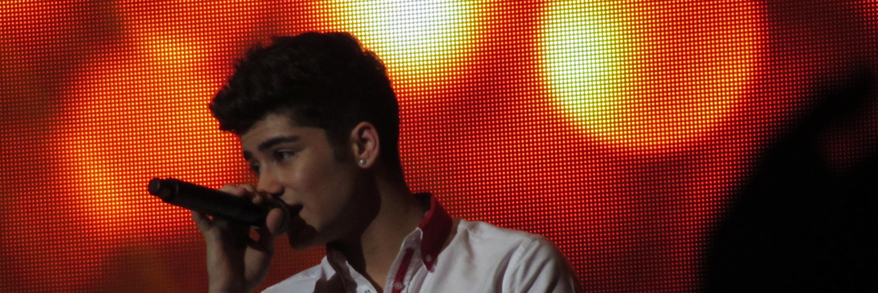 Zayn Malik Discusses Setting Anxiety Boundaries in Us Weekly Interview Zayn Malik performing at a concert