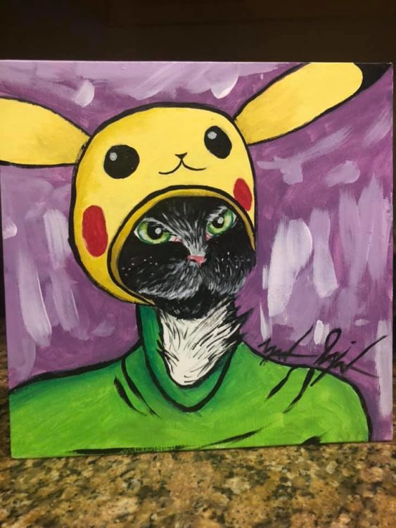 painting of cat in pikachu hat