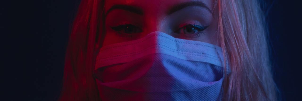 When You Fear Being Hungry and Not Having Food During the Coronavirus photo of woman looking into camera and wearing face mask