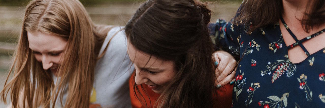 When You Love Someone With Borderline Personality Disorder Three young women with their arms around each other