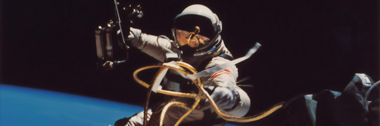 How Health Care Can Improve in America After COVID-19 photo of astronaut over the earth in space