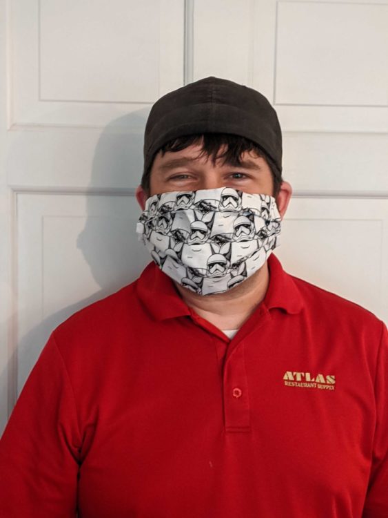 Man wearing star wars face mask 