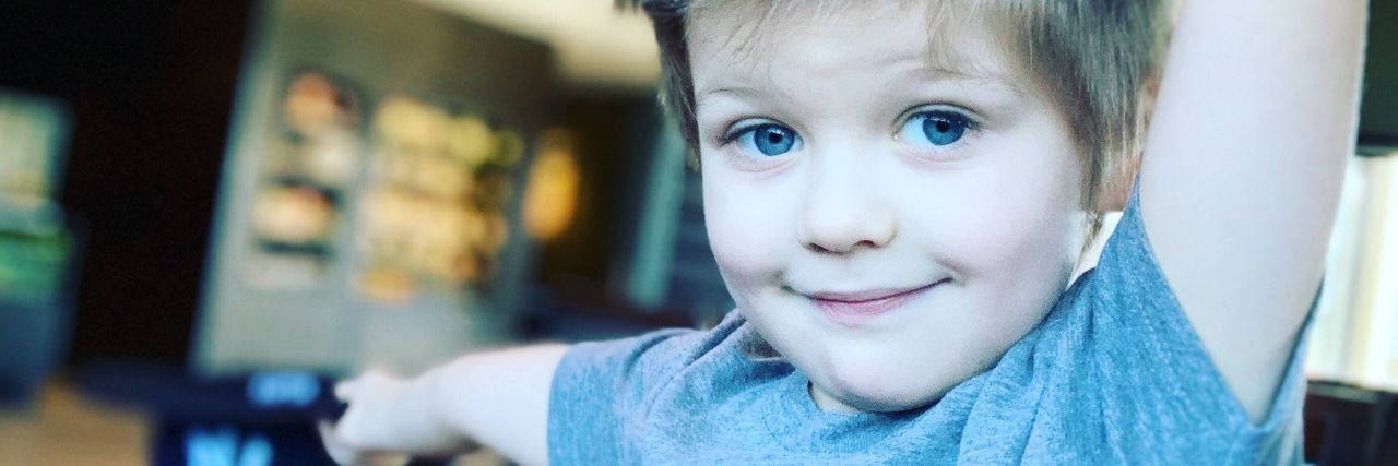 Parent of an Autistic Child Responds to the TikTok 'Autism Challenge' Wilson smiling at the camera.