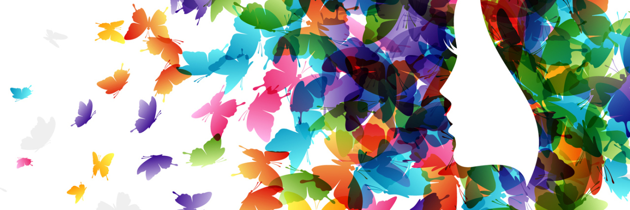 How I Found Eating Disorder Recovery Success During COVID-19 illustration of woman in profile with colourful butterflies as her hair, breaking apart