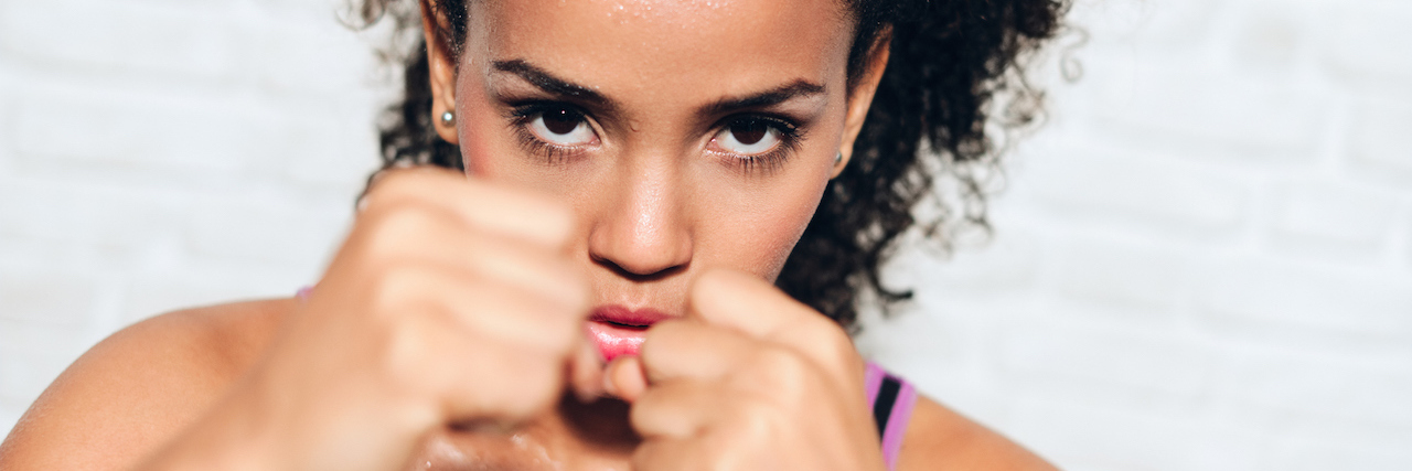 Borderline Personality Disorder: When You Feel Emotions Too Intensely A woman with her fists up