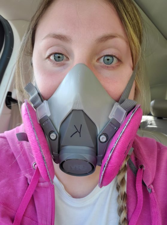 woman wearing industrial pink face mask