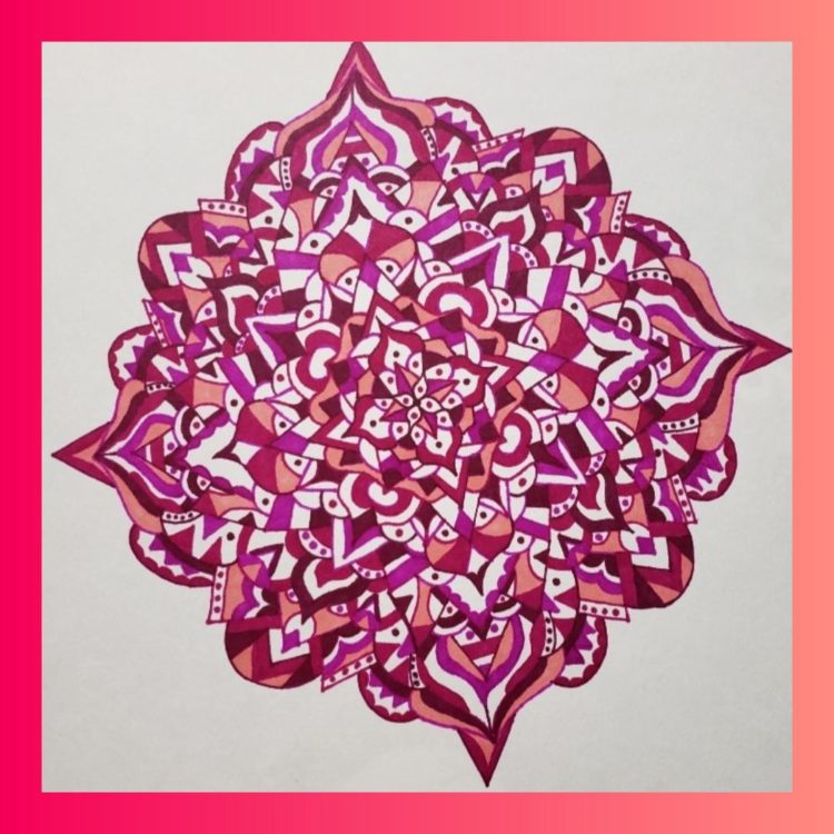 The author's mandala of self-compassion, colored in shades of red and pink.