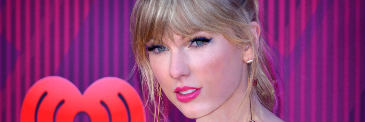 How Taylor Swift's Music Helps Me Through the Bad Days of My Illness Taylor Swift in a sparkly dress on the red carpet