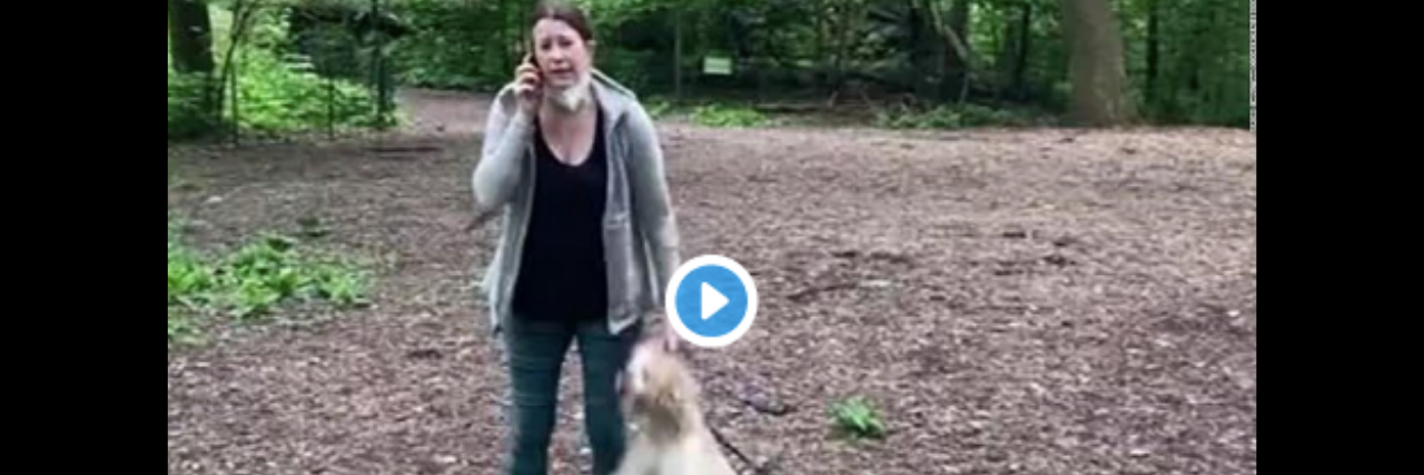 Anxiety Can't Be Blamed for Amy Cooper Calling Police on Black Man Amy Cooper talking on her phone holding her dog