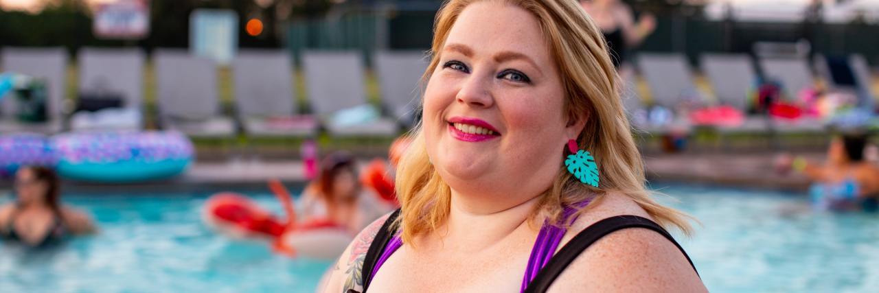 Society-Influenced Negative Consequences of Being Overweight A woman smiling in a bathing suit