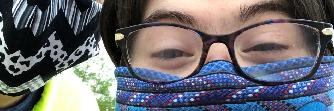 Keeping My Adult Daughter With Down Syndrome Safe During COVID-19 Rachel and her dad wearing masks.