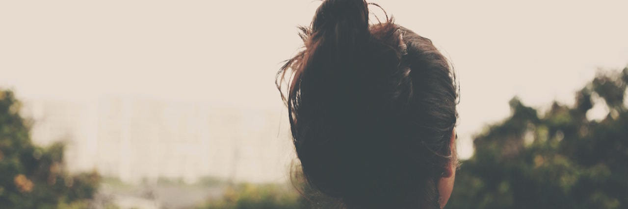 5 Signs It Might Be Time to Find Another Friend Woman looking into the distance