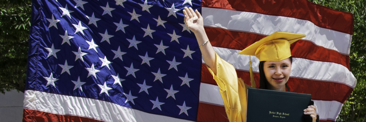 Believing in a Positive Future for Your Child With Down Syndrome Yassy wearing her cap and gown.