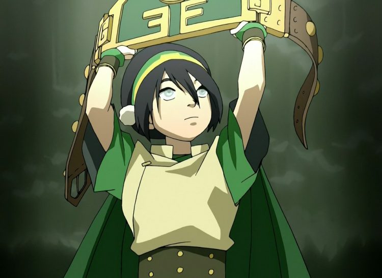 Toph from Avatar: The Last Airbender holds an earthbending fight prize