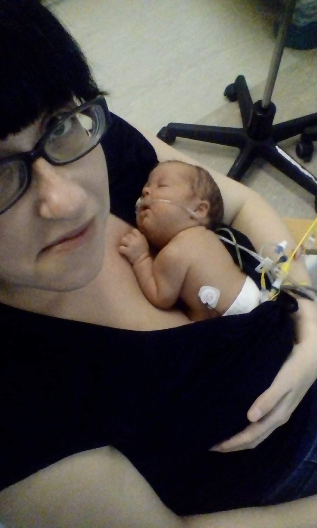 Rachel holding newborn Betsy.