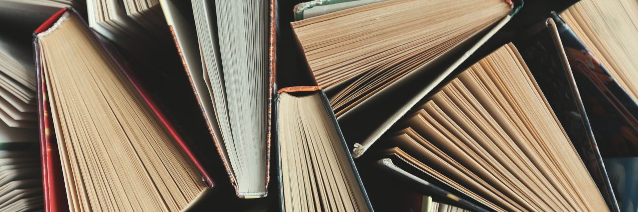 Making Poetry Books Accessible to People With Disabilities Stack of books.