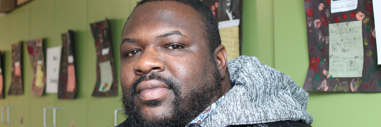 The Unwritten Rules Blacks Learn to Navigate Racism in America Darnell Hill, a black man looking at the camera with facial hair and a black jacket