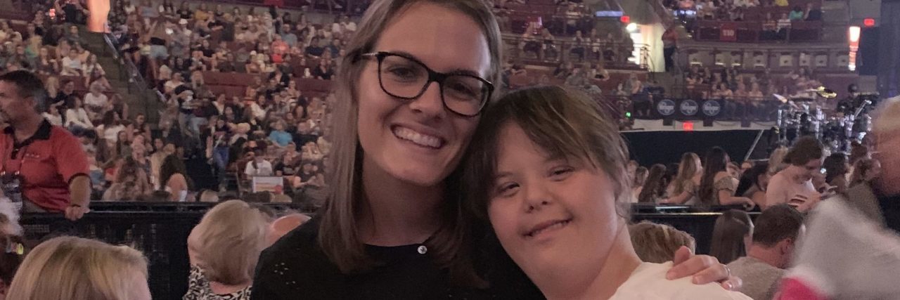 Supporting a Sibling With a Disability in Adulthood Transitions Allison with her sister at a concert.