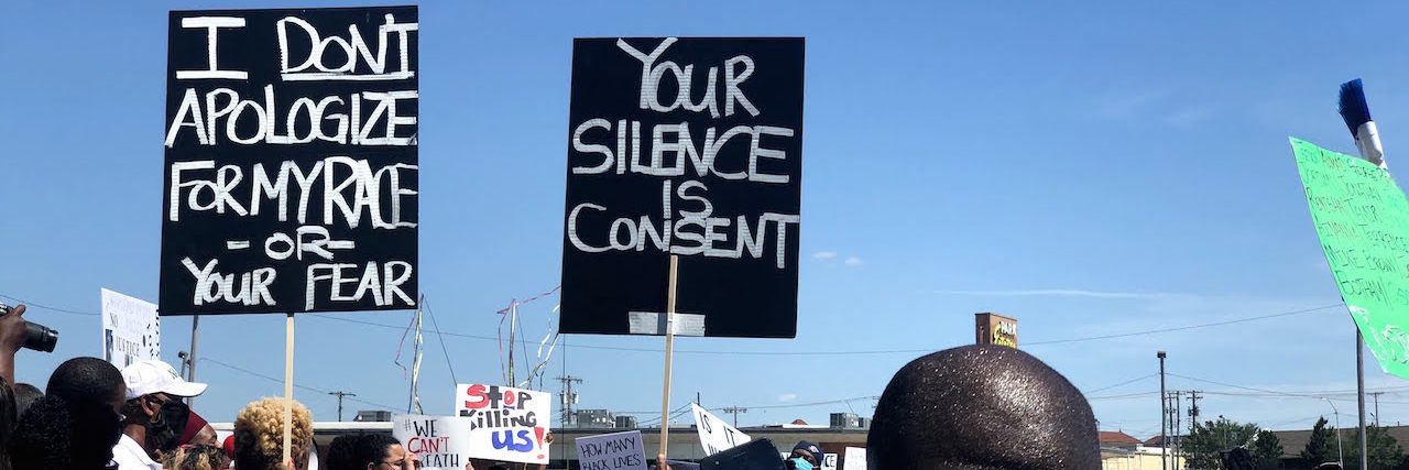 How to Start Talking About Race During George Floyd Protests crown protesting for Black Lives Matter