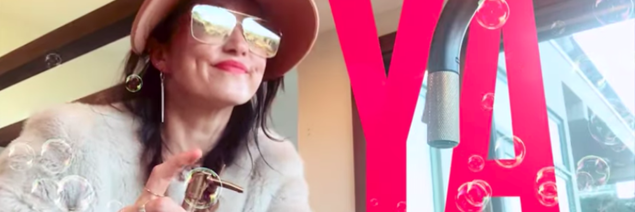 KT Tunstall Releases 'Wash Ya Hands' as COVID-19 Reminder KT Tunstall holding a bottle of soap in "Wash Ya Hands" video