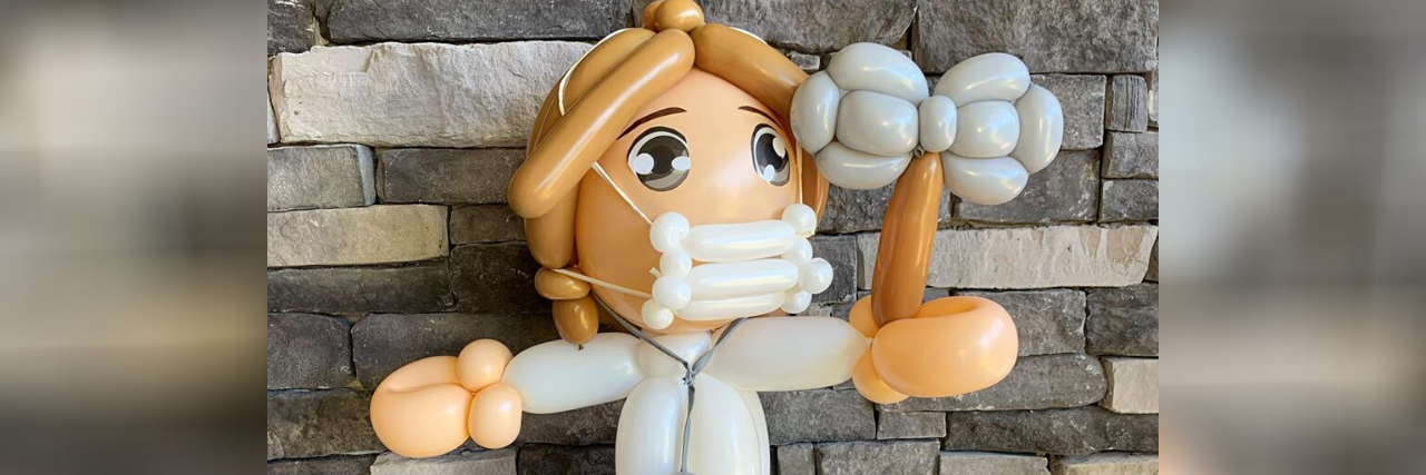 Autistic Balloon Artist Creates Sculptures for Frontline Workers Female nurse figured made out of balloons