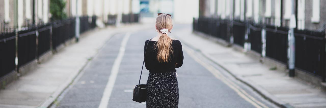 When You're Scared of Returning to 'Normal' After COVID-19 Lockdown photo of a woman standing in an empty street